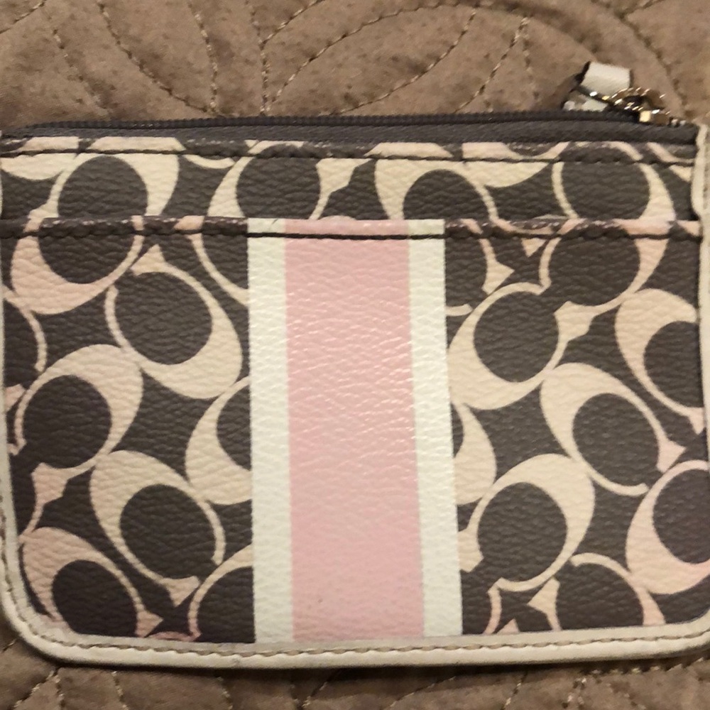 Small coach wallet with pink accents!